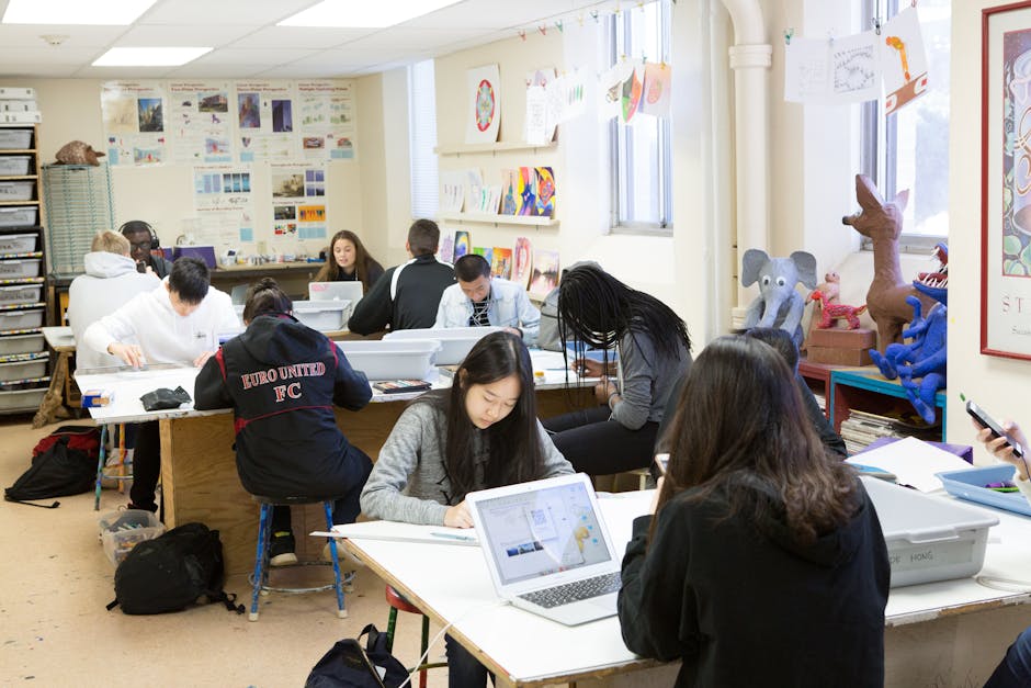 A group of diverse students studying and collaborating in a vibrant and creative classroom setting.